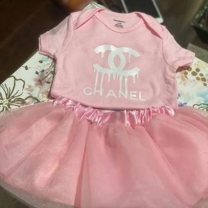 Pink baby onsie and tutu